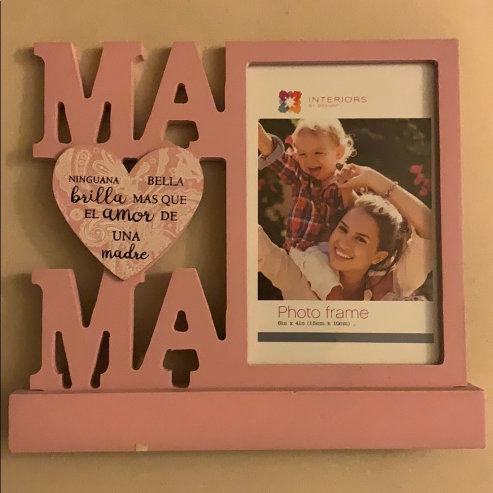 Pink picture frame for mom and baby.